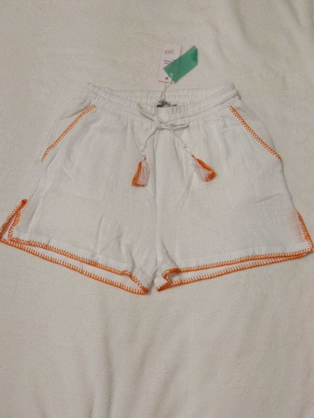 High-Waist White Drawstring Shorts with Orange Contrast Trim